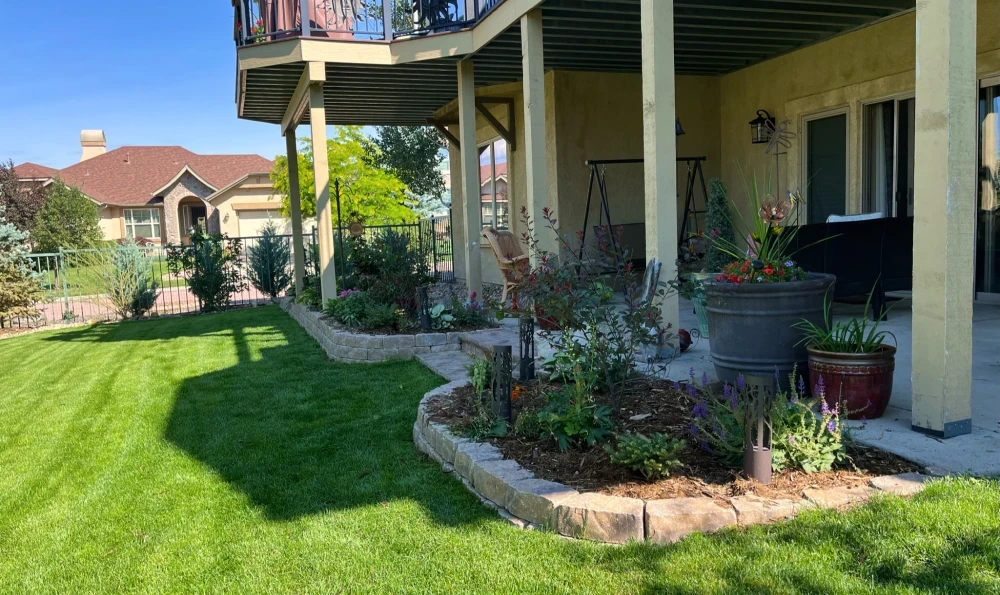 Newly revived garden beds with a new retaining wall.